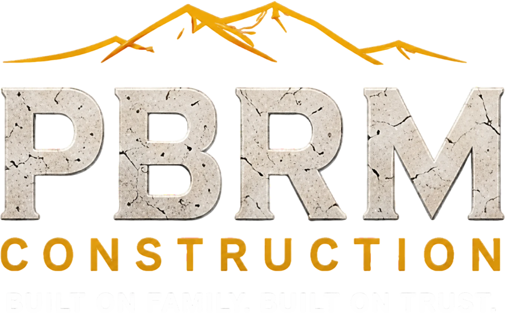 PBRM Construction logo with mountains and tagline