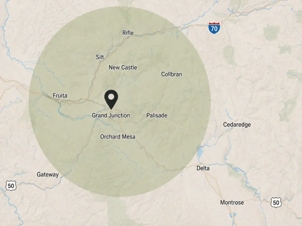 Map showing PBRM Construction service area centered on Grand Junction, Colorado with surrounding towns and highways.